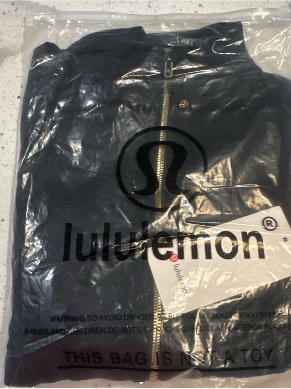 lululemon athletica Black Bomber Jacket with Gold Zipper